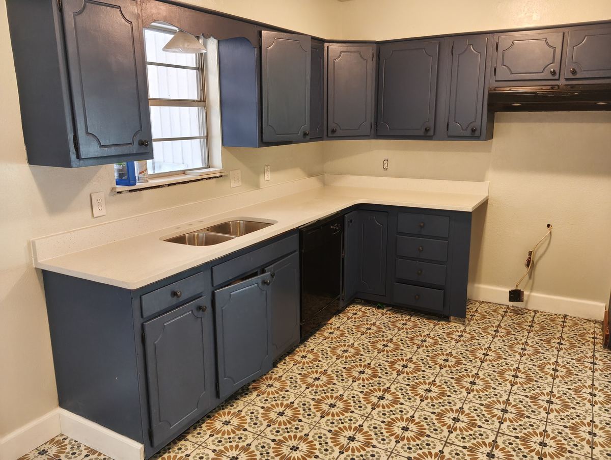 Project 8 after: navy kitchen